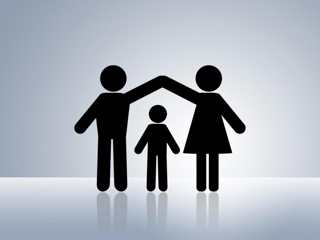 Black stick figure icons of two adults forming an arch over a child, representing a family, on a reflective surface with a gradient background—perfect for illustrating services from a Mesa Wills Attorney.